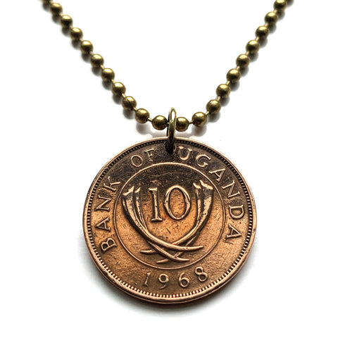 1968 Uganda 10 Cents coin pendant necklace Elephant tusks Kampala Mbale Nansana Kira Makindye Ssabagabo Mbarara Mukono Gulu Lugazi Kasese Masaka Wakiso Buikwe Swahili Kiswahili African Great Lakes East Africa Ganda Luganda Buganda Bantu Karamojong n000214