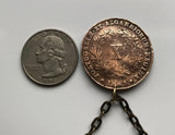 1843 Portugal 10 Reis coin pendant Portuguese 5 Quinas castles Quincunx cross Lisboa Porto Sintra Braga Coimbra Évora Faro Santa Maria de Belém Vila Nova de Gaia Mirandese Guimarães Praia da Marinha Viseu Setúbal Amadora Funchal Almada Portalegre n003585