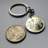 Republic of China ROC Formosa 1 Yuan coin pendant Taiwanese Chinese Plum blossom national flower meihua Taipei Taichung Kaohsiung Taoyuan Tainan Hsinchu Keelung Chiayi Formosa Kuomintang Sun Yat-sen Xinhai Hsinhai 1911 revolution Japanese apricot  n000231