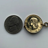 1957 Italy 20 Lire coin bracelet lady Minerva Rome Florence Venice Milan Torino Palermo Napoli Genoa Verona Perugia Siena Padua Bologna Modena Tuscany Cagliari Pisa Bergamo Matera Bari Lecce San Gimignano Trieste Ferrara Sorrento Taranto Capri b000087