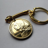 1963 France 50 Centimes coin keychain key ring French jewelry Marianne Paris Marseille Lyon Toulouse Bordeaux Lille Nice Rennes Reims Nantes Le Havre Toulon Dijon Strasbourg Seine Saint-Etienne Normandy K000025