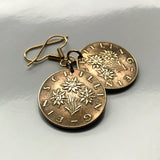 Austria Osterreich 1 Schilling coin earrings Edelweiss flower Alpine plant daisy sunflower Vienna Wien Salzburg Graz Linz Innsbruck Klagenfurt Villach Tyrol Styria Carinthia Sankt Polten Wels e000057
