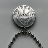 1985 Rwanda 1 Franc coin pendant Rwandese Pearl Millet flower African finger Millet Plant cereal crops grains Kinyarwanda Kigali Gisenyi Banyarwanda Abahutu Hutu Bantu Batwa Tutsi Twa people Butare Gitarama Ruhengeri Byumba Cyangugu Kibuye n001305