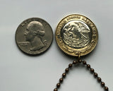 2018 Mexico 10 Pesos coin pendant necklace jewelry Aztec sun stone calendar Piedra del Sol Mexica sculpture Tōnatiuh Tlaltecuhtli Yohualtecuhtli Tenochtitlan Tecpatl knife Zócalo Templo Mayor Toltec Hidalgo n000160