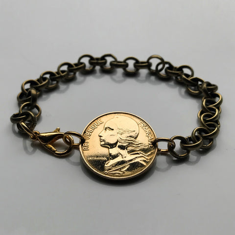 1969 France 10 Centimes coin bracelet Marianne Paris Marseille Lyon Toulouse Bordeaux Lille Nice Rennes Mont Saint-Michel Reims Avignon Nantes Le Havre Toulon Dijon Seine Montpellier Strasbourg Carcassonne Saint-Etienne Normandy Metz Côte d'Azur b000035