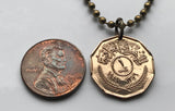 1959 Iraq 1 Fils coin pendant sun disk Shamash Ishtar Baghdad Arab Kurds Persian Gulf middle east Islam muslim Tigris Euphrates Kufi cradle of civilization n002704
