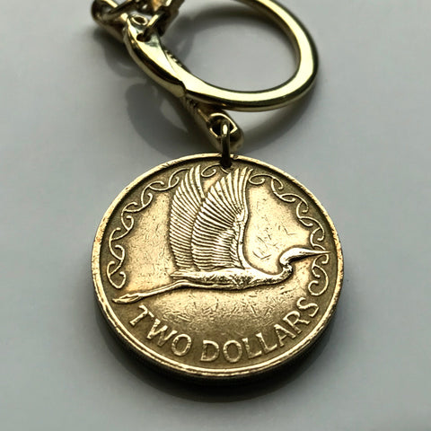 1990 New Zealand 2 Dollar coin pendant Kotuku white heron bird te reo Māori Polynesia Oceania Christchurch haka dance  Milford Sound n003087