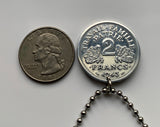 1943 French Vichy State France 2 Francs coin pendant The Francisque Labrys double axe WWII World War 2 Nazi Germany occupation Allier Massif Central Clermont-Ferrand Auvergne Rhône Alpes Cher Nièvre Saône Loire Paris Marshal Philippe Pétain n003649