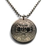 1907 Haiti 20 Centimes coin pendant Haitian flags cannons palm trees Port-au-Prince Cap-Haïtien Carrefour Delmas Pétion-Ville Port-de-Paix Croix des Bouquets Jacmel Léogâne Les Cayes Citadelle Laferrière Sans-Souci Palace Minot Artibonite Gonaïves n001600