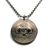 1907 Haiti 20 Centimes coin pendant Haitian flags cannons palm trees Port-au-Prince Cap-Haïtien Carrefour Delmas Pétion-Ville Port-de-Paix Croix des Bouquets Jacmel Léogâne Les Cayes Citadelle Laferrière Sans-Souci Palace Minot Artibonite Gonaïves n001600