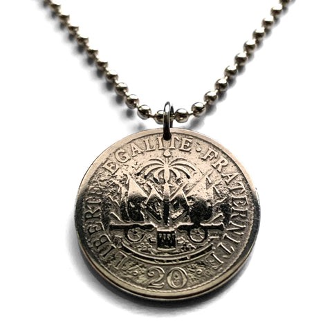 1907 Haiti 20 Centimes coin pendant Haitian flags cannons palm trees Port-au-Prince Cap-Haïtien Carrefour Delmas Pétion-Ville Port-de-Paix Croix des Bouquets Jacmel Léogâne Les Cayes Citadelle Laferrière Sans-Souci Palace Minot Artibonite Gonaïves n001600