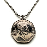 1997 Bailiwick of Guernsey UK 50 Pence coin pendant freesia flowers blossom Saint Peter Port Castle Cornet Fort Grey British n003886