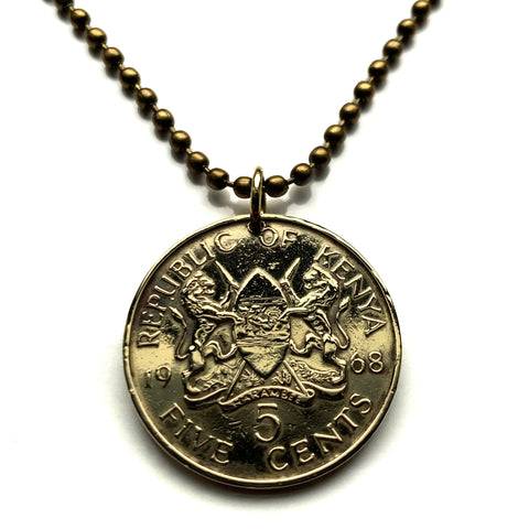 Kenya 5 Cents coin pendant Kenyan lions East African shield Nairobi Mombasa Nakuru Ruiru Eldoret Thika Naivasha Kikuyu Kalenjin Kisumu Harambee Kiswahili Great Rift Valley Kiswahili safari KANU n001571