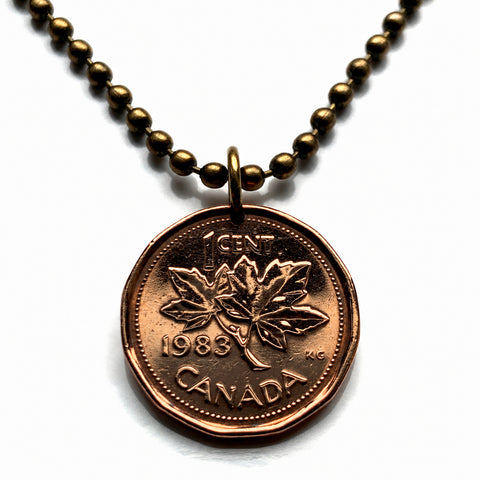 1983 Canada 1 Cent coin pendant necklace jewelry Canadian maple leaves twig Queen Elizabeth II Ottawa Montreal Quebec Toronto Ontario Vancouver Calgary British Columbia Alberta Nova Scotia New Brunswick Manitoba Nunavut Victoria beaver n003714