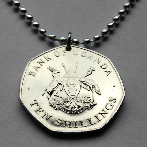 1987 Uganda 10 Shillings coin pendant Ugandan Kob Crested Crane bird spears Kampala Nansana Kira Makindye Ssabagabo Mbarara Mukono Gulu Lugazi Kasese Masaka Wakiso Buikwe Swahili Kiswahili African Great Lakes Victoria Ganda Karamojong Luganda n001517