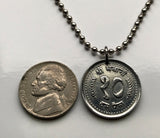 1986 Nepal 10 Paisa coin pendant Himalayas Mount Everest flags kukris royal headdress Gorakhnath paduka footprints Kathmandu Pokhara n003565