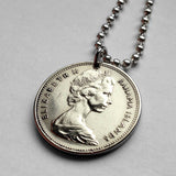 Bahamas 25 Cent coin pendant Bahamian Sloop sailboat Nassau Andros Exuma & Cays Junkanoo Rose Island Rum Cay Paradise Island Pineapple Fest Gregory Town Blue Lagoon Lucayan New Providence Eleuthera Grand Bahama Gold Rock Coco Plum Beach n000204