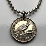 1965 New Zealand 6 Pence coin pendant huia bird wattlebird Wellington Auckland Marae Koruru Hawaiki North South Island haka dance Te Reo Te Waipounamu Christchurch Hamilton Tauranga Cook Strait Waikato New Zealanders Milford Sound Polynesia n000106